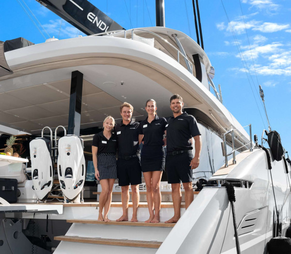 The friendly and professional crew of luxury crewed yacht Endless Horizon ready to welcome guests on board - Horizon Luxury Crewed