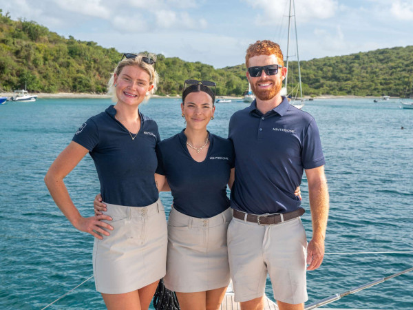 The warm and professional crew of luxury crewed yacht Minted One ready to deliver an unforgettable charter experience - Horizon Luxury Crewed